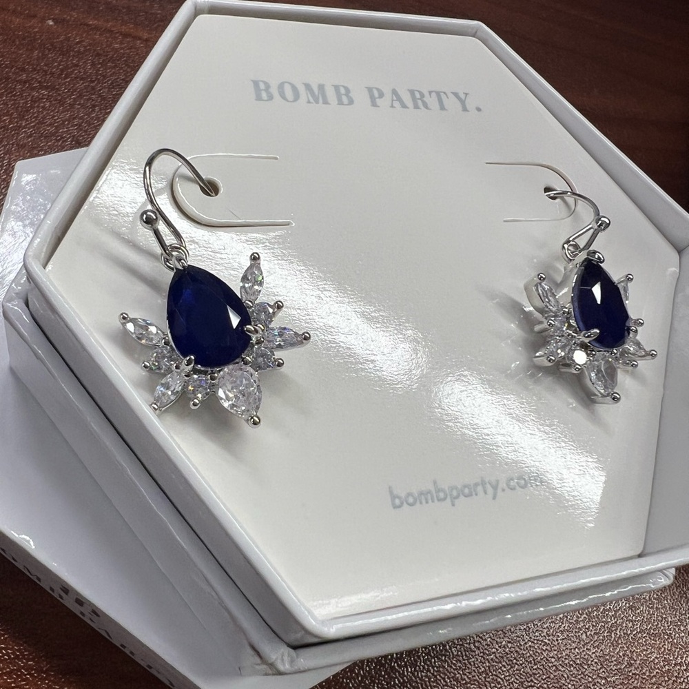 Bomb party earrings - new in box